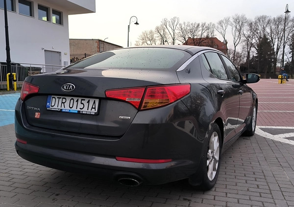 Kia Optima cena 28900 przebieg: 280000, rok produkcji 2011 z Trzebnica małe 137
